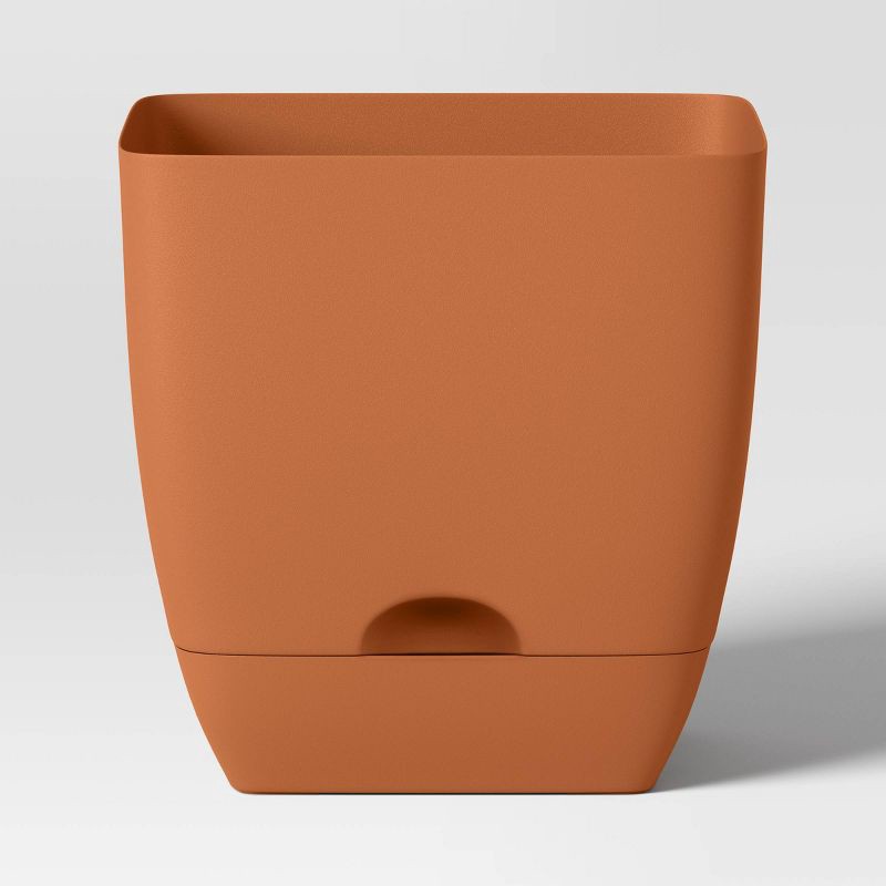slide 1 of 4, Square Self-Watering Plastic Indoor Outdoor Planter Pot Orange 10"x10" - Room Essentials™, 1 ct