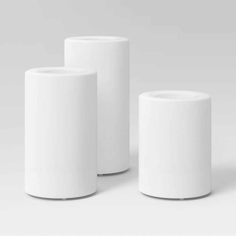 slide 1 of 5, 3pc AA LED Plastic Flameless Pillar Colorful Candles with Timer and Remote -Threshold™, 3 ct