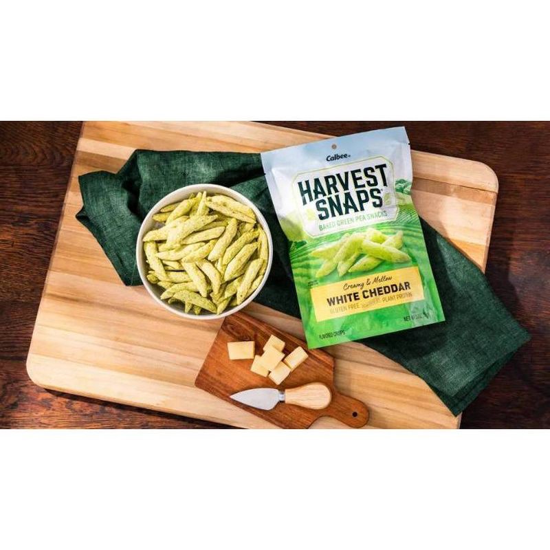 slide 2 of 4, Harvest Snaps White Cheddar Baked Green Pea Snacks - 8.5oz, 8.5 oz