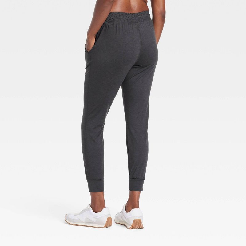 slide 2 of 5, Women's Soft Stretch Mid-Rise Jogger Pants - All In Motion™ Heathered Black S: Recycled Polyester, Slim Fit, UPF 50+, 1 ct