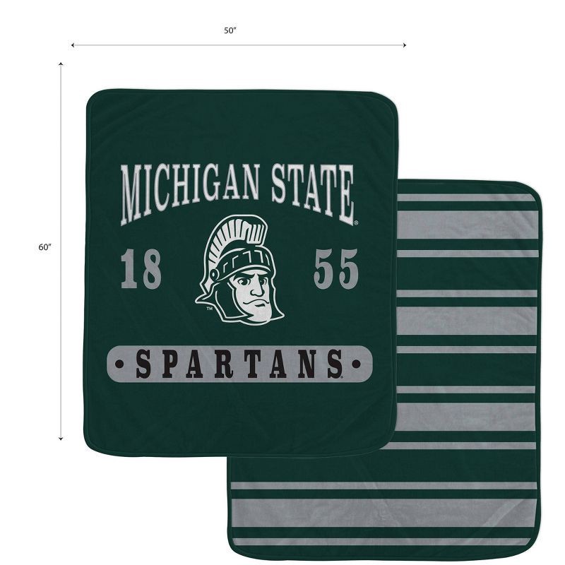 slide 2 of 3, NCAA Michigan State Spartans Varsity Plaque Double Sided Royal Plush Blanket: Sports Team Logo, 1 ct