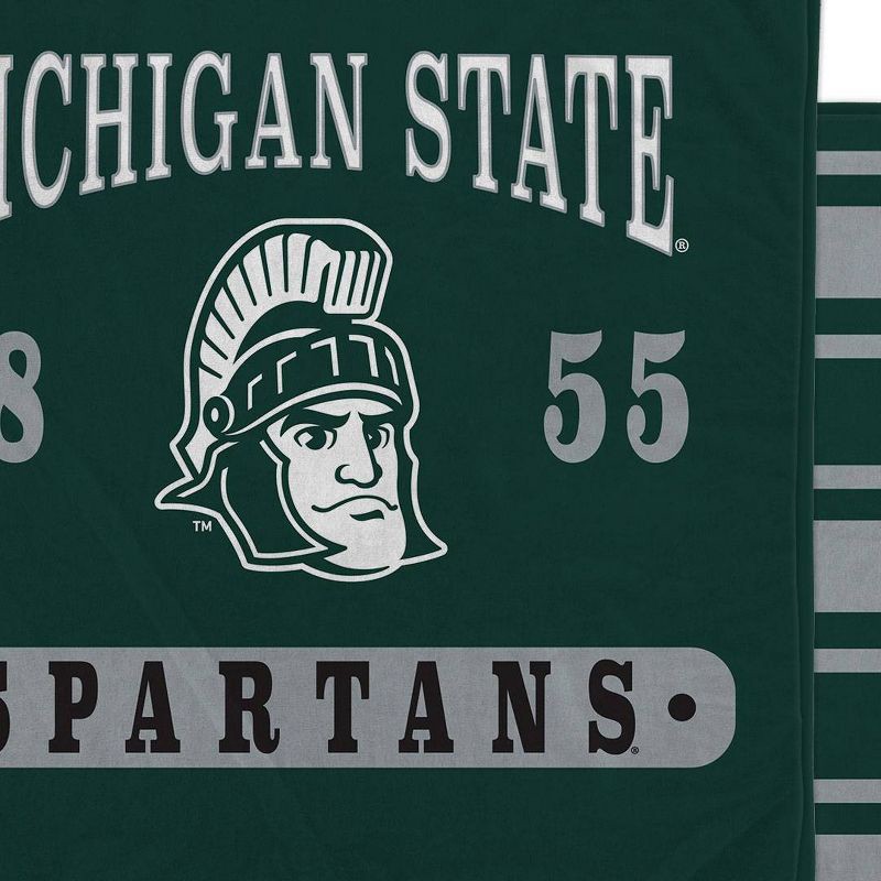 slide 3 of 3, NCAA Michigan State Spartans Varsity Plaque Double Sided Royal Plush Blanket: Sports Team Logo, 1 ct