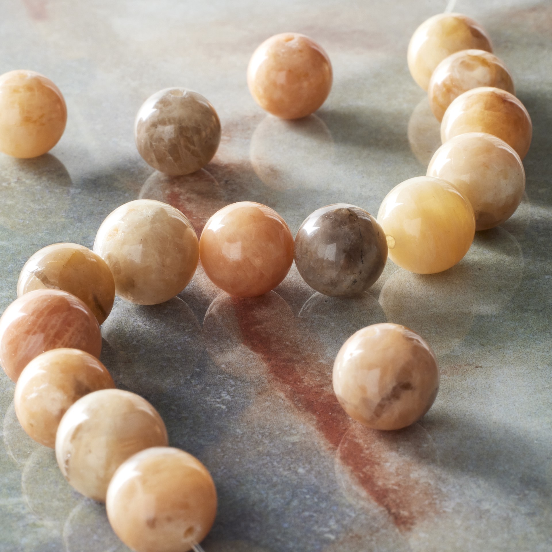 slide 2 of 3, Natural Tone Sunstone Round Beads, 10mm By Bead Landing, 10mm