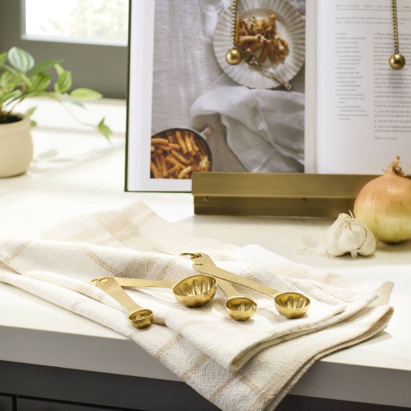 slide 2 of 3, Hearth & Hand with Magnolia 4pc Stainless Steel Measuring Spoons Vintage Brass Finish - Hearth & Hand™ with Magnolia, 4 ct