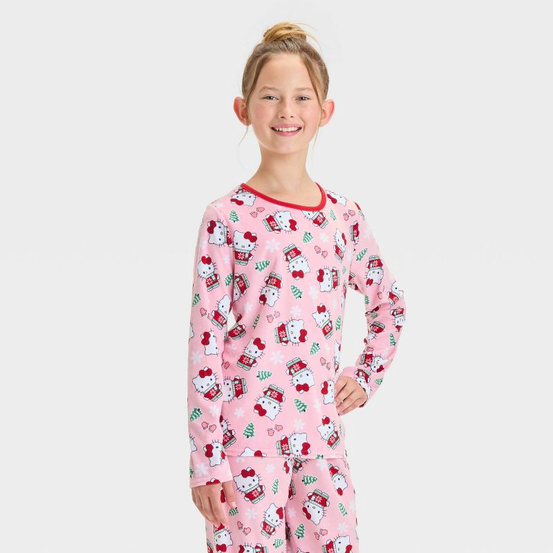 slide 3 of 5, Girls' Hello Kitty Christmas 2pc Cozy Pajama Set and Socks - Pink S, 2 ct