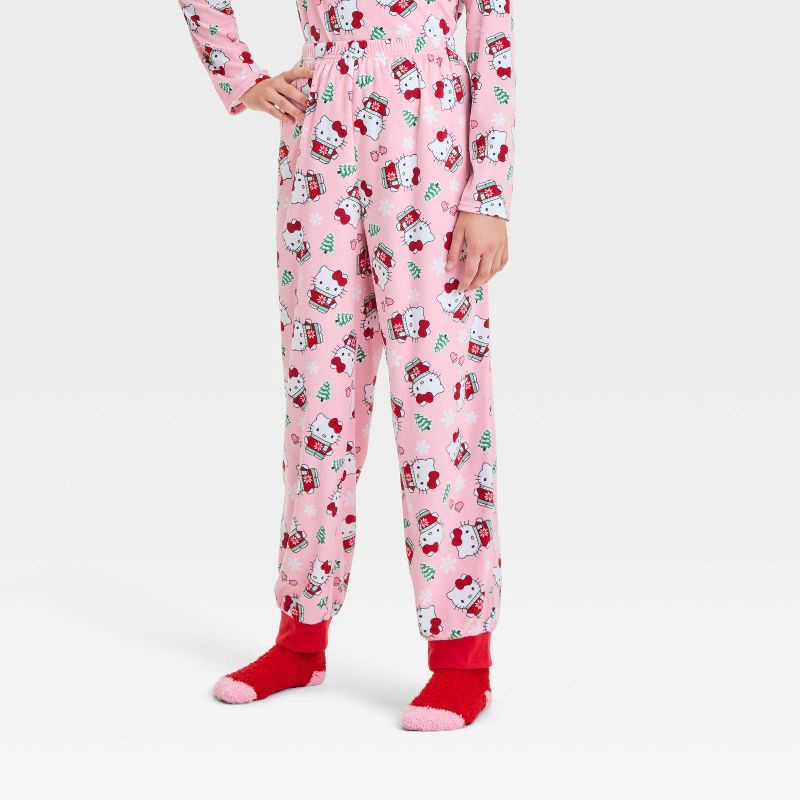 slide 4 of 5, Girls' Hello Kitty Christmas 2pc Cozy Pajama Set and Socks - Pink S, 2 ct