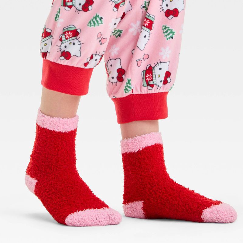 slide 5 of 5, Girls' Hello Kitty Christmas 2pc Cozy Pajama Set and Socks - Pink S, 2 ct