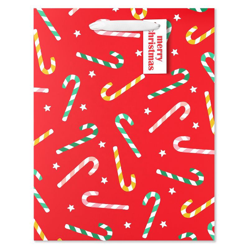 slide 2 of 3, American Greetings 13" Large Christmas Gift Bag Candy Canes on Red, 1 ct