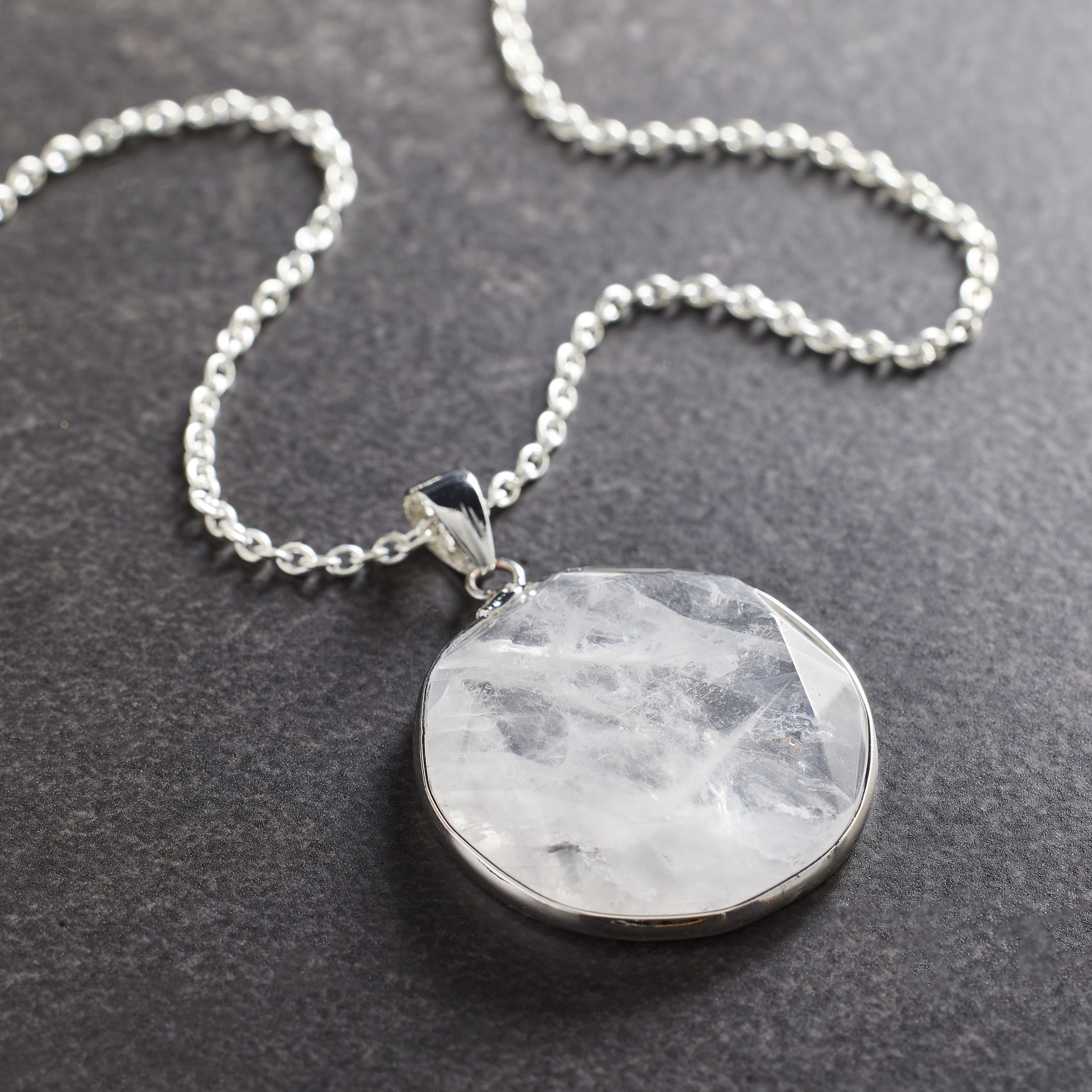 slide 3 of 3, White Quartz Round Faceted Pendant By Bead Landing, 30 mm