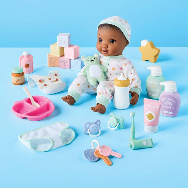 slide 2 of 5, 14" Baby Doll Set - Dark Brown Hair + Brown Eyes - Gigglescape™: Includes Plush, Pacifier, Play Food, Keychain, 1 ct