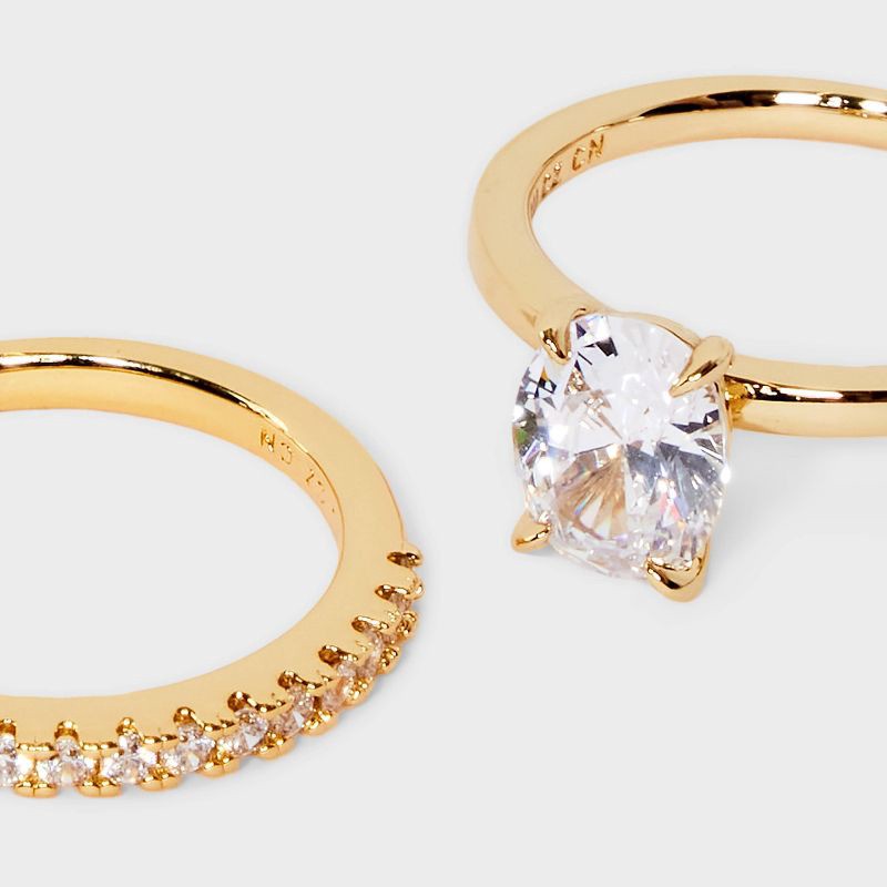 slide 3 of 3, 14K Gold Plated Oval Cubic Zirconia and Pave Band Wedding Ring Set 2pc - A New Day™ Gold 7: Nickel-Free, Polished Finish, Size 7, 2 ct