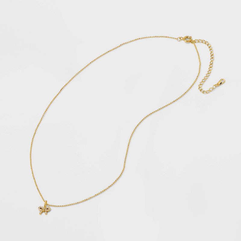 slide 3 of 4, 14K Gold Plated Brass Pave Cubic Zirconia Bow Necklace - A New Day™ Gold: Nickel-Free, 19" with Extender, 1 ct