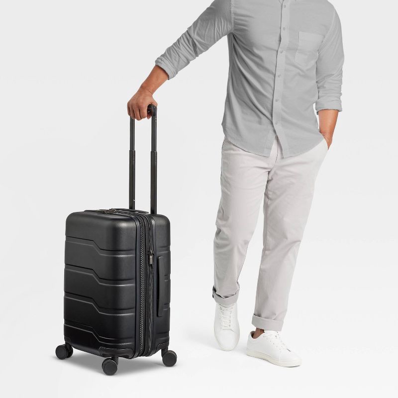 slide 2 of 5, Hardside Carry On Spinner Suitcase Black - Open Story™️: Telescoping Handle, 8 Wheels, 1 ct
