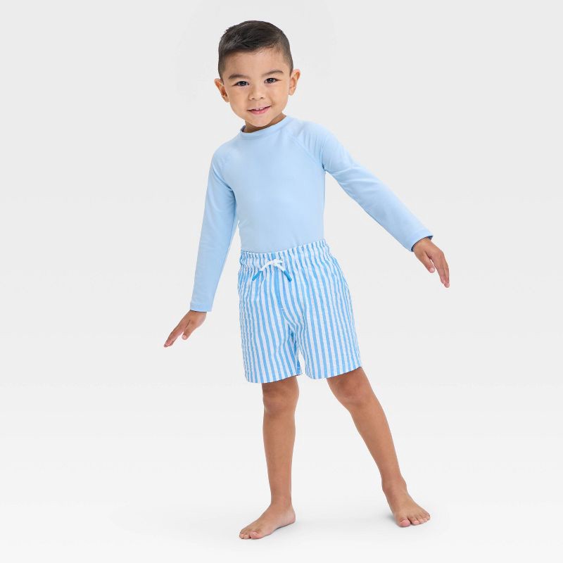 slide 3 of 3, Baby Boys' Striped Seersucker Swim Shorts - Cat & Jack™ Blue 18M: Mesh Liner, Adjustable Waistband, Built-in Brief, 3.5" Inseam, 1 ct