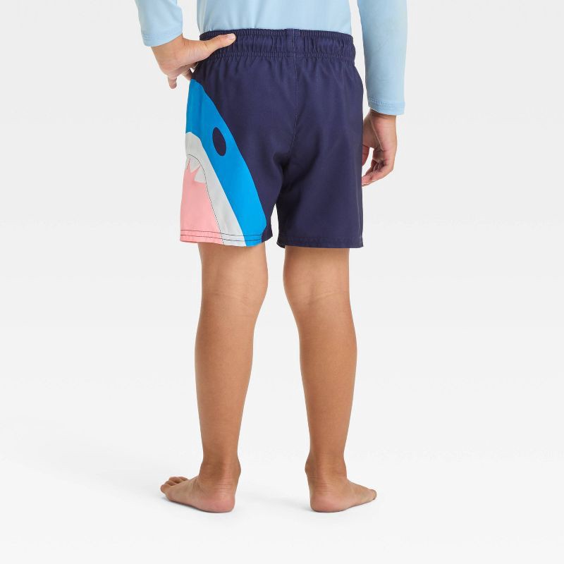slide 2 of 3, Baby Boys' Shark Bite Swim Shorts - Cat & Jack™ Navy 18M: Toddler Swim Trunks, UPF 50+, Built-in Brief, Elastic Waistband, 1 ct
