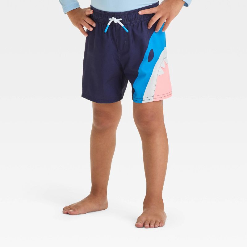 slide 1 of 3, Baby Boys' Shark Bite Swim Shorts - Cat & Jack™ Navy 18M: Toddler Swim Trunks, UPF 50+, Built-in Brief, Elastic Waistband, 1 ct