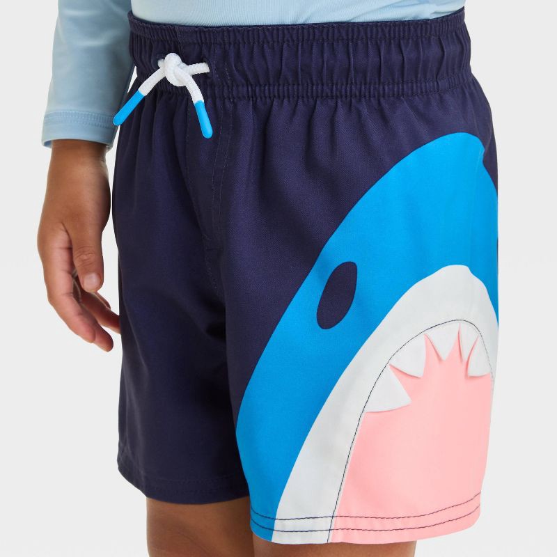 slide 3 of 3, Baby Boys' Shark Bite Swim Shorts - Cat & Jack™ Navy 18M: Toddler Swim Trunks, UPF 50+, Built-in Brief, Elastic Waistband, 1 ct