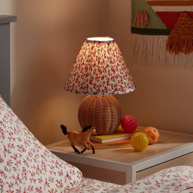 slide 3 of 4, Round Faux Rattan Kids' Lamp with Pleated Floral Shade - Pillowfort™, 1 ct