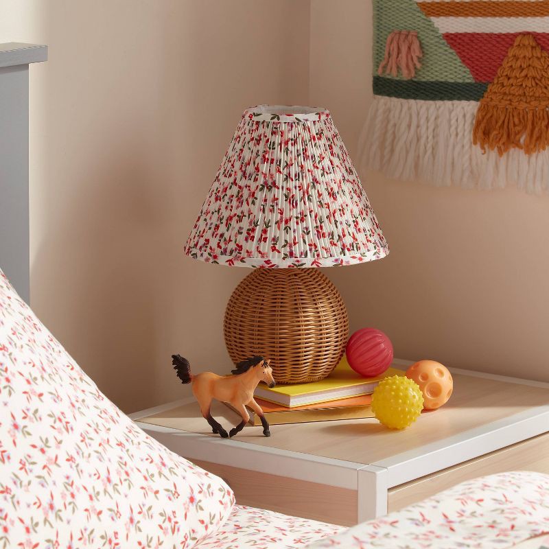 slide 1 of 4, Round Faux Rattan Kids' Lamp with Pleated Floral Shade - Pillowfort™, 1 ct