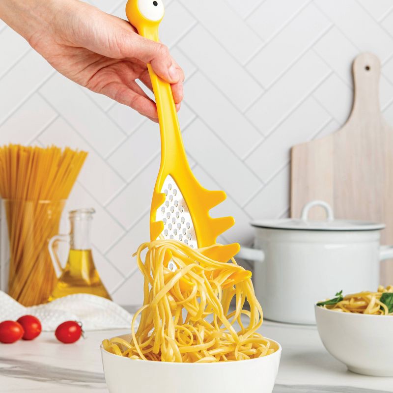 slide 2 of 6, Ototo Monster Pasta Spoon and Grater: Heat-Resistant, Dishwasher-Safe, Stainless Steel & ABS, Yellow, Silicone Handle, 1 ct
