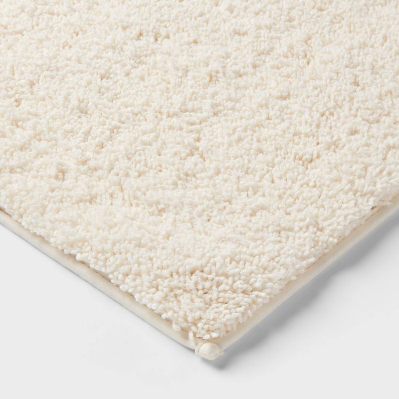 slide 3 of 4, 20"x34" Performance Plus Plush Non Skid Bath Rug Cream - Threshold™, 1 ct