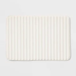 17"x24" Ribbed Cushion Foam Bath Rug Cream - Room Essentials™