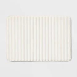 17"x24" Ribbed Cushion Foam Bath Rug Cream - Room Essentials™