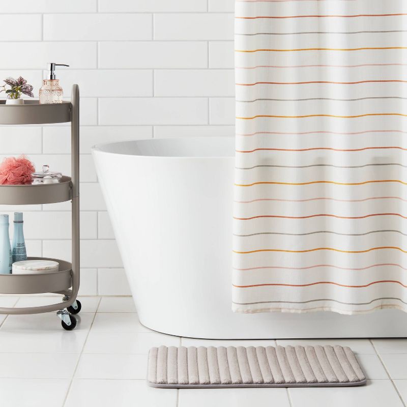 slide 2 of 4, 17"x24" Ribbed Cushion Foam Bath Rug Light Gray - Room Essentials™, 1 ct