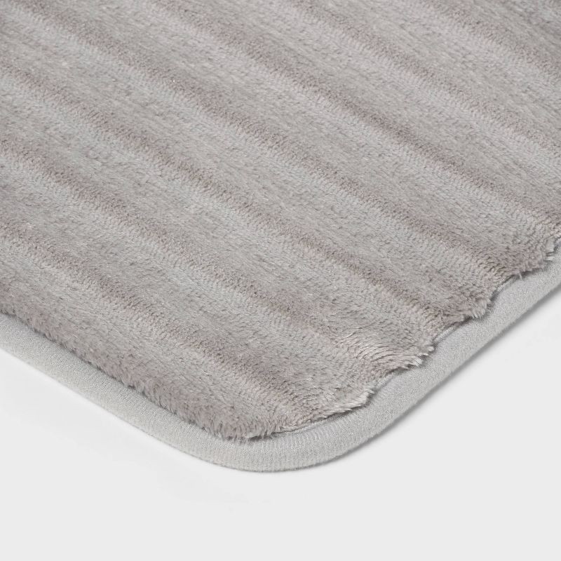slide 3 of 4, 17"x24" Ribbed Cushion Foam Bath Rug Light Gray - Room Essentials™, 1 ct
