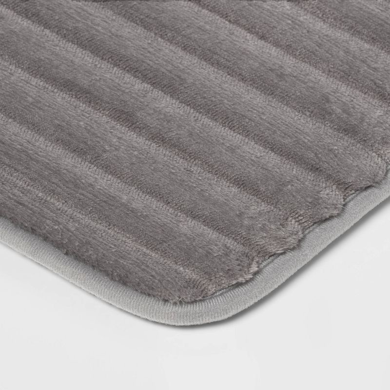 slide 3 of 4, 17"x24" Ribbed Cushion Foam Bath Rug Dark Gray - Room Essentials™, 1 ct