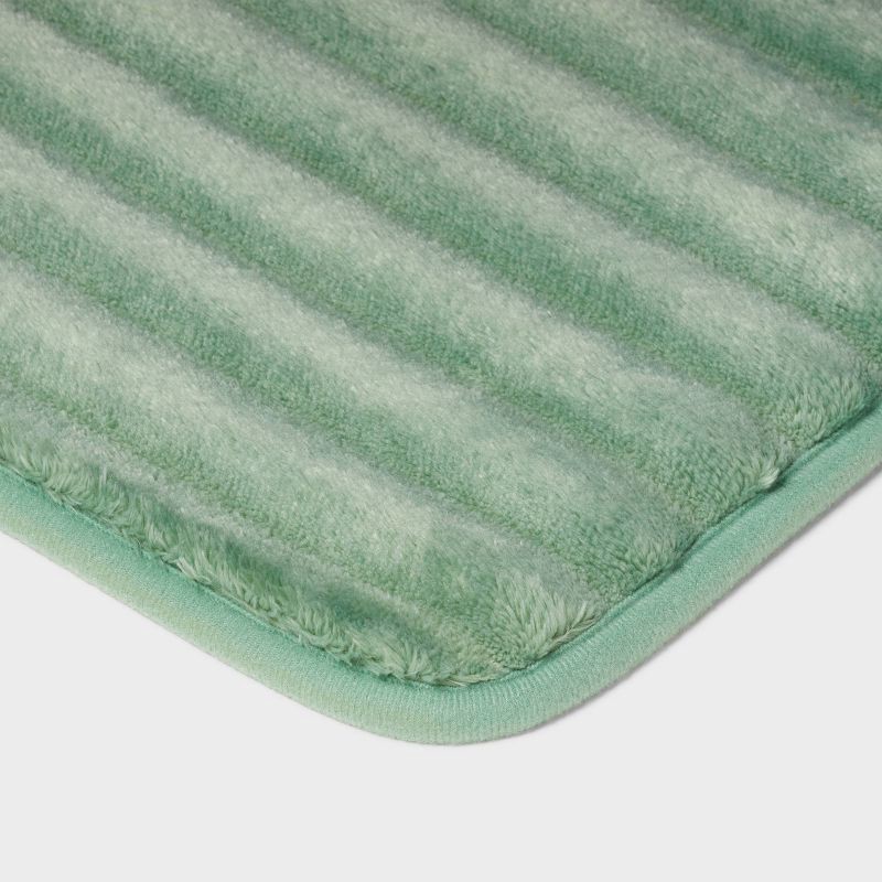 slide 3 of 4, 17"x24" Ribbed Cushion Foam Bath Rug Light Green - Room Essentials™, 1 ct
