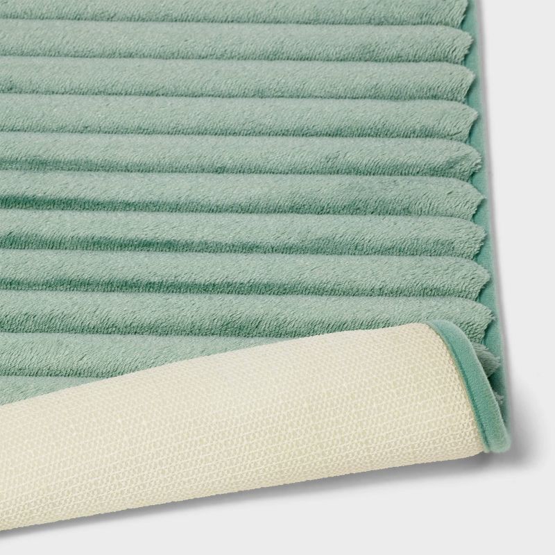 slide 4 of 4, 17"x24" Ribbed Cushion Foam Bath Rug Light Green - Room Essentials™, 1 ct