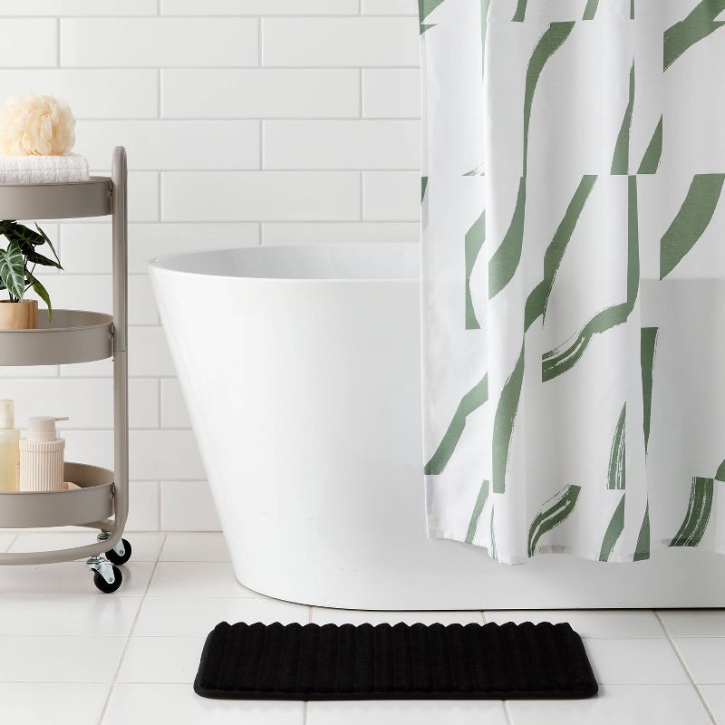 slide 2 of 4, 17"x24" Ribbed Cushion Foam Bath Rug Black - Room Essentials™, 1 ct