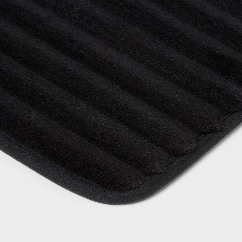 slide 3 of 4, 17"x24" Ribbed Cushion Foam Bath Rug Black - Room Essentials™, 1 ct