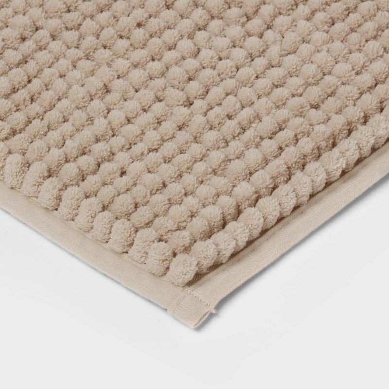 slide 2 of 4, 20"x34" Low Chenille Memory Foam Bath Rug Tan - Threshold™, 1 ct