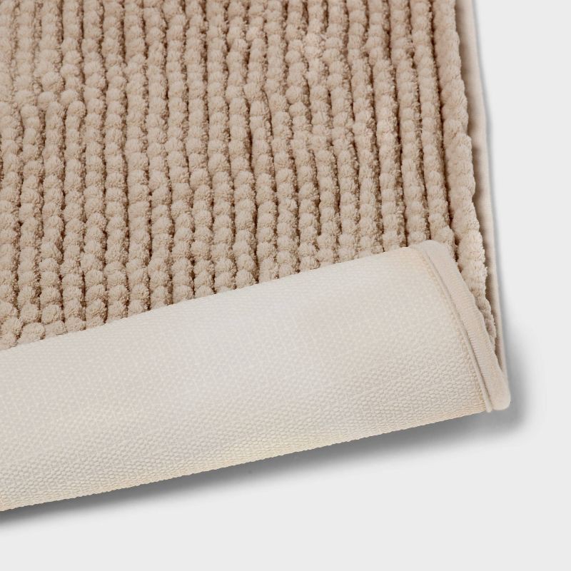 slide 4 of 4, 20"x34" Low Chenille Memory Foam Bath Rug Tan - Threshold™, 1 ct
