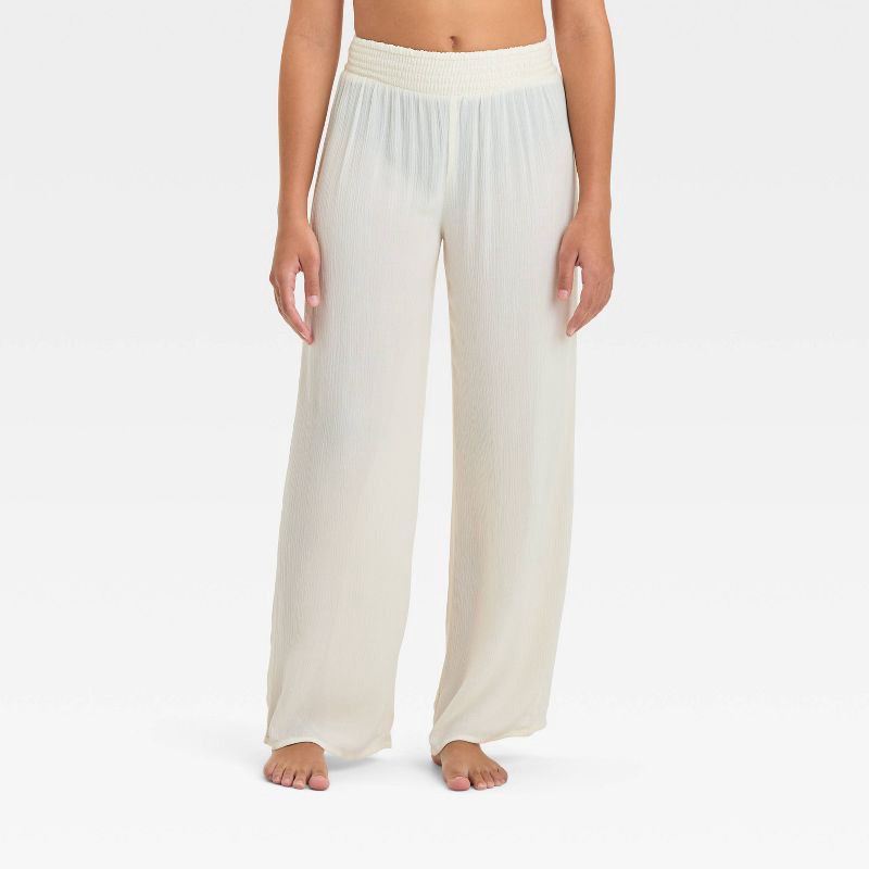 slide 1 of 3, Girls' Solid Cover Up Pants - art class™ Cream M: Mid Rise, Side Pocket, UPF 50+, 1 ct
