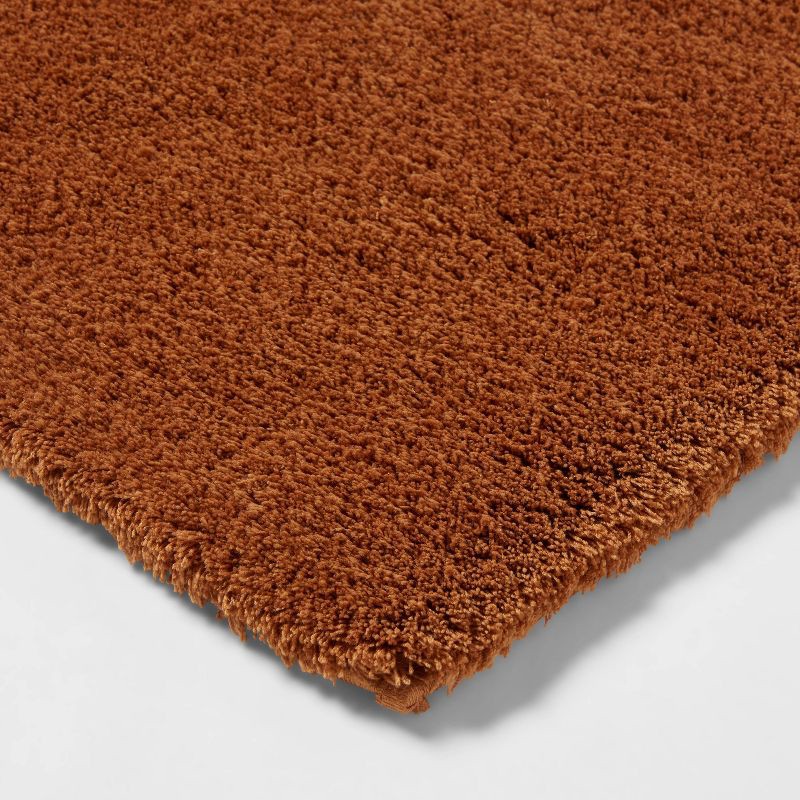 slide 3 of 4, 21"x34" Spa Plush Bath Rug Caramel - Threshold™, 1 ct