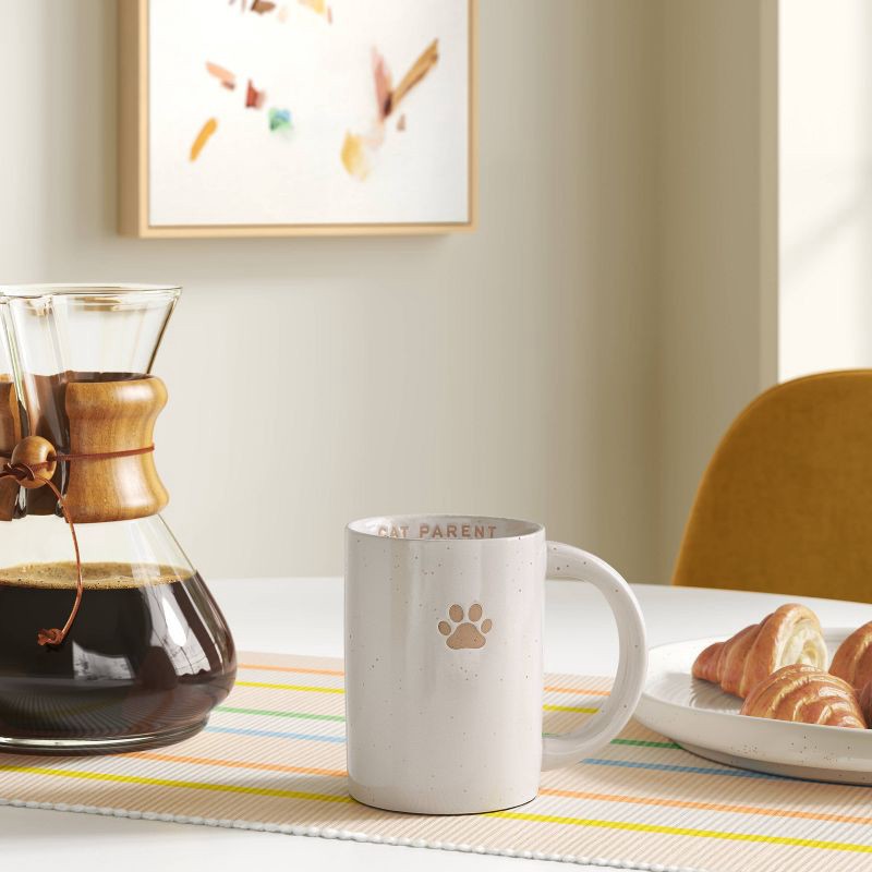 slide 2 of 3, 14oz Stoneware Embossed Paw Cat Parent Mug Ivory - Room Essentials™, 14 oz