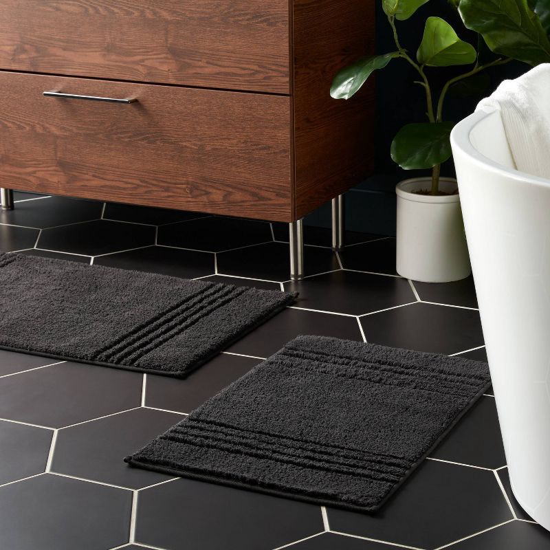 slide 2 of 4, 2pc 17"x24" and 20"x34" Performance Plus Textured Cotton Striped Non Skid Bath Rug Set Black - Threshold™, 2 ct