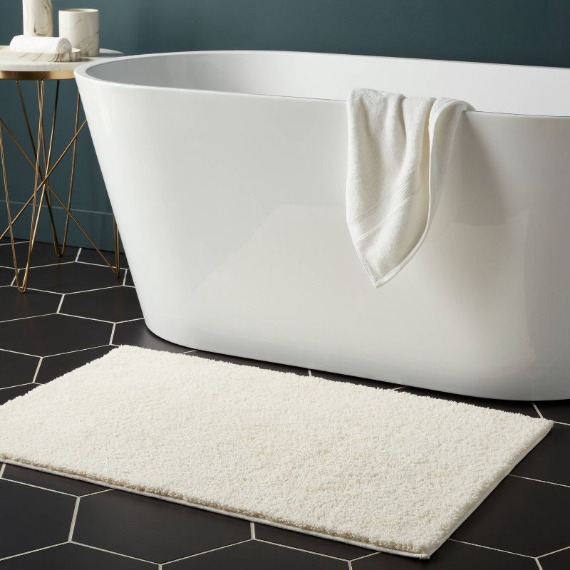 slide 2 of 4, 24"x38" Performance Plus Plush Non Skid Bath Rug Cream - Threshold™, 1 ct