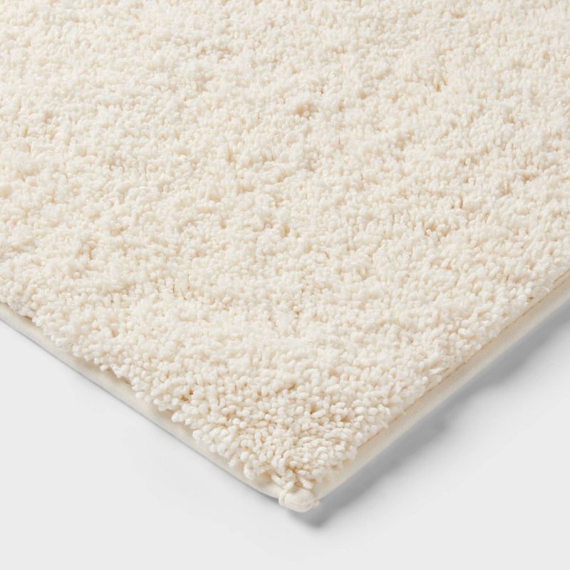 slide 3 of 4, 24"x38" Performance Plus Plush Non Skid Bath Rug Cream - Threshold™, 1 ct