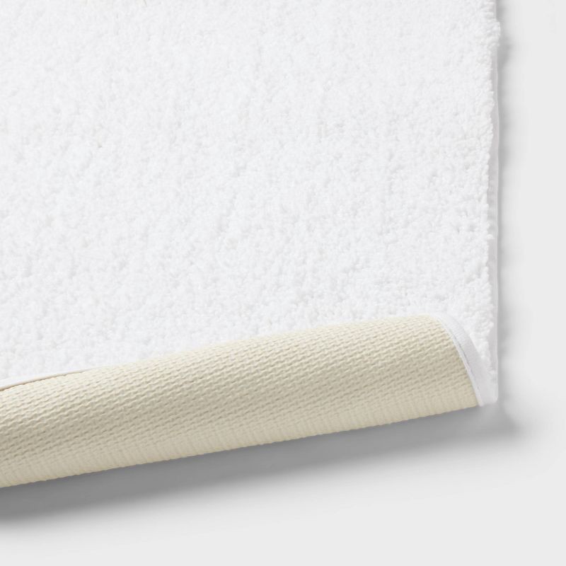 slide 4 of 4, 24"x38" Performance Plus Plush Non Skid Bath Rug White - Threshold™, 1 ct