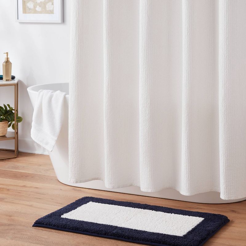 slide 2 of 4, 20"x34" Fluffy Border Memory Foam Bath Rug Navy - Threshold™, 1 ct