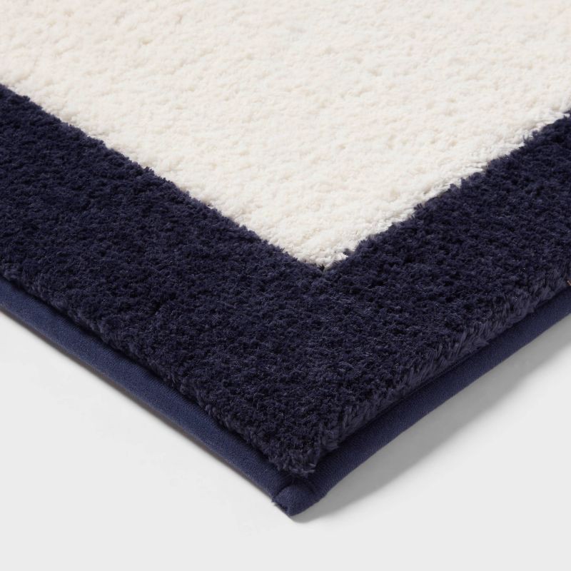 slide 3 of 4, 20"x34" Fluffy Border Memory Foam Bath Rug Navy - Threshold™, 1 ct