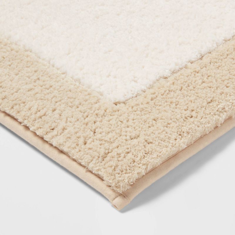 slide 3 of 4, 20"x34" Fluffy Border Memory Foam Bath Rug Tan - Threshold™, 1 ct