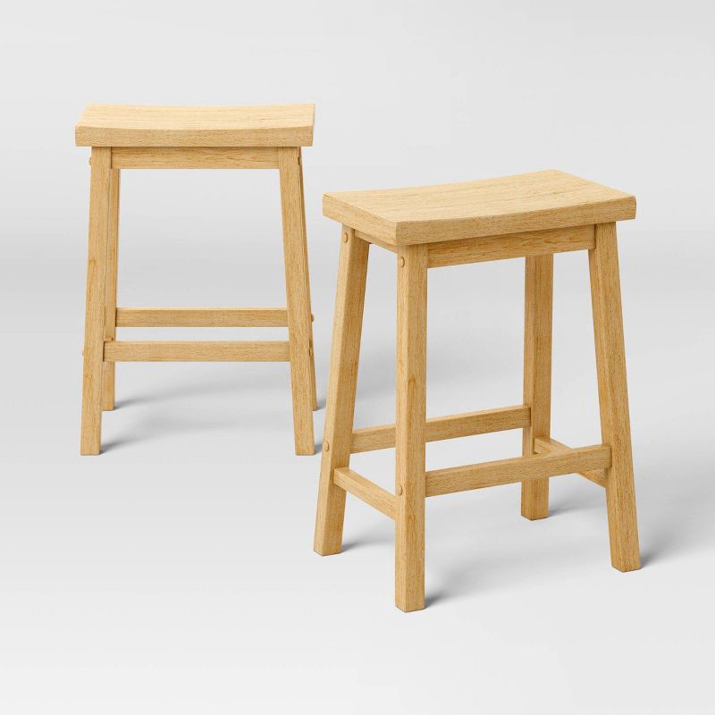 slide 1 of 6, Set of 2 24" Solid Wood Backless Saddle Counter Height Barstools Natural - Room Essentials™, 1 ct