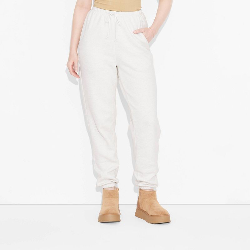 slide 2 of 3, Women's High-Rise Slim Fit Joggers - Wild Fable™ Heather Gray M: Cotton Blend, Elastic Waist, Fleece, 29" Inseam, 1 ct