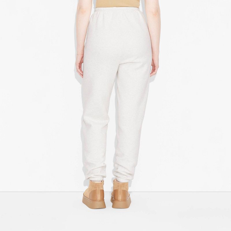 slide 3 of 3, Women's High-Rise Slim Fit Joggers - Wild Fable™ Heather Gray M: Cotton Blend, Elastic Waist, Fleece, 29" Inseam, 1 ct