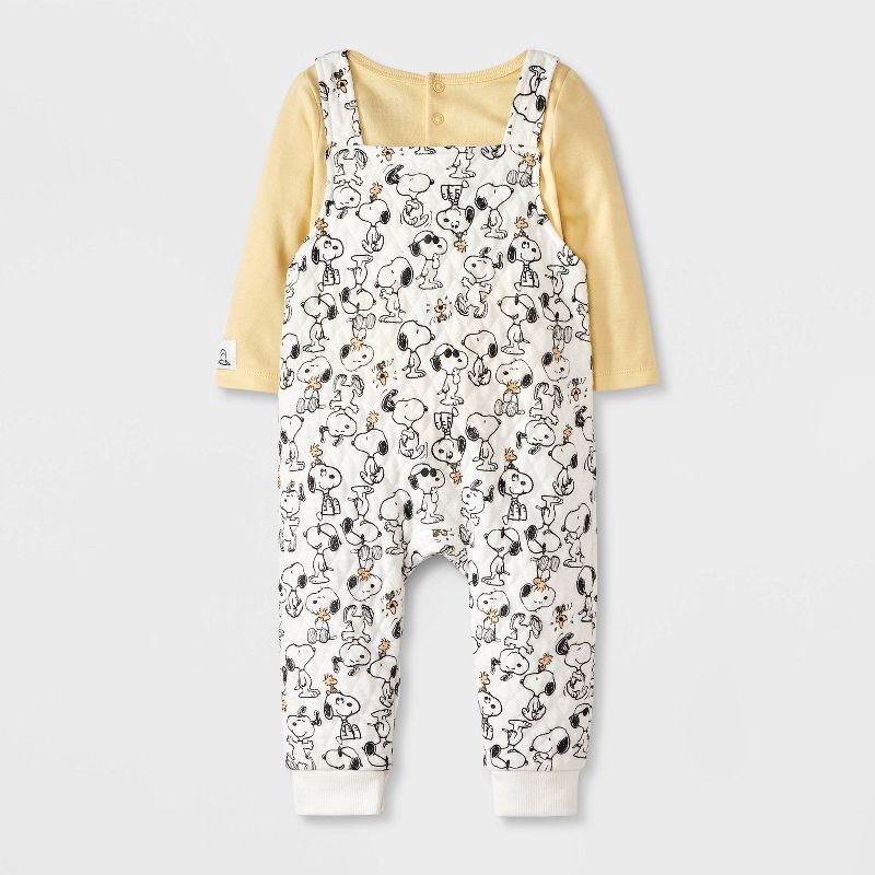 slide 2 of 4, Baby Boys' Peanuts Snoopy 2pc Long Sleeve Bodysuit and Quilted Overalls Set - Yellow/Beige 12M, 2 ct